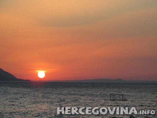 Komarna, turisti, zalazak sunca