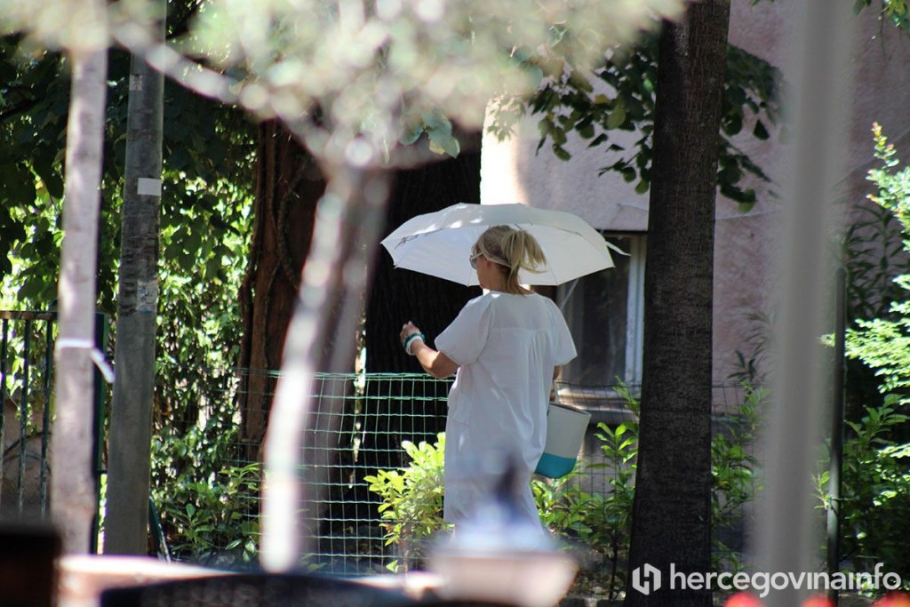 Vrućina žena kišobran