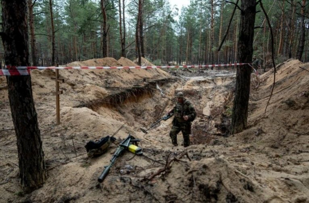 izyum,ukrajina,rat u ukrajini,masovna grobnica,Rusija,zločini