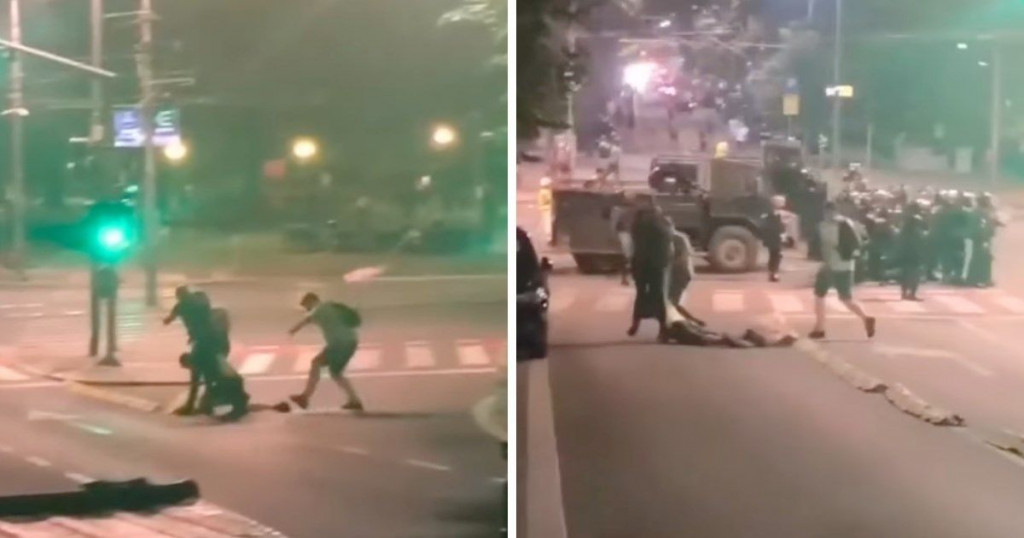 policija i mladić prosvjed Beograd